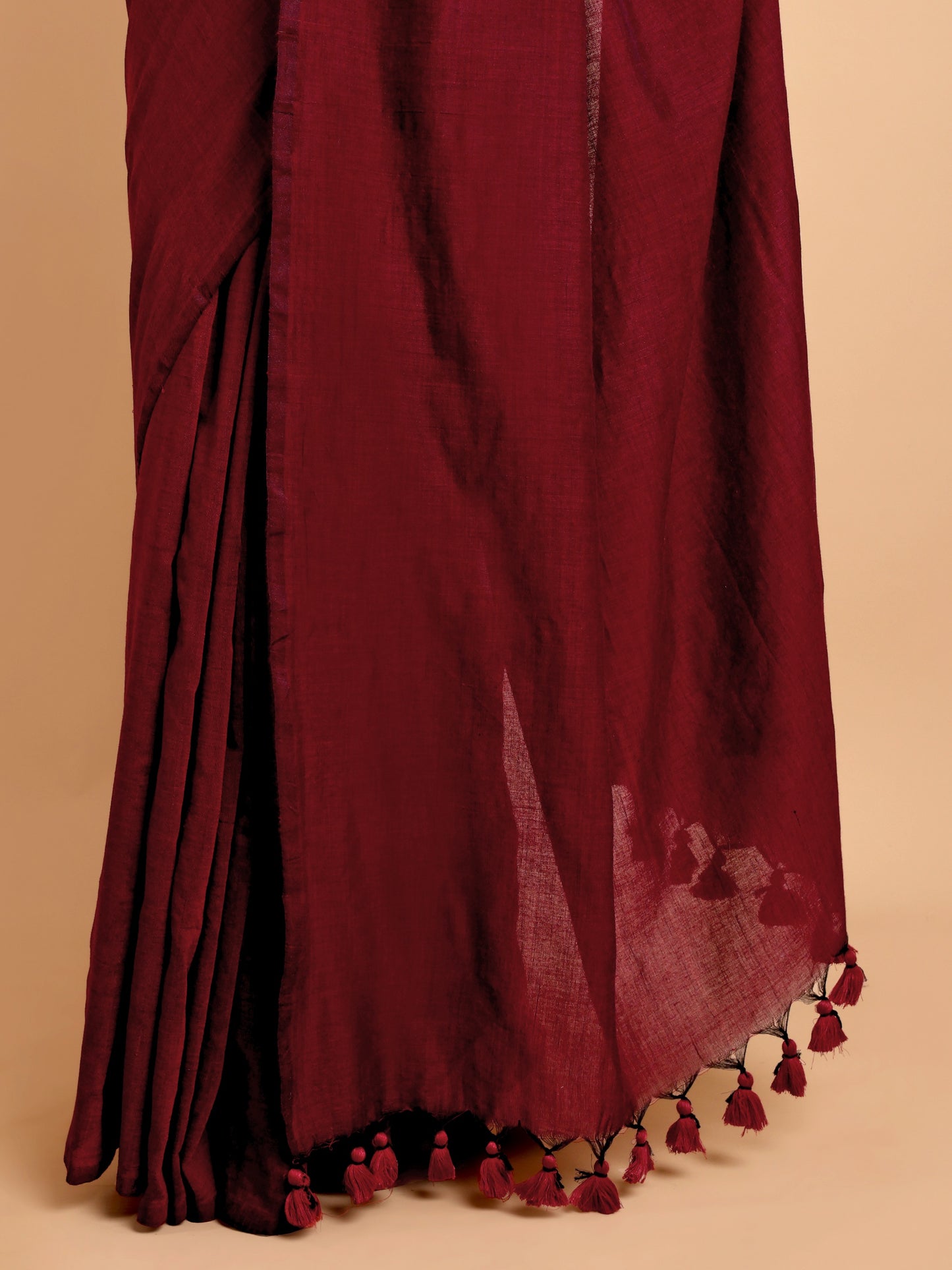 Elegant Maroon Khadi Cotton Saree with Handcrafted Tassel Detailing