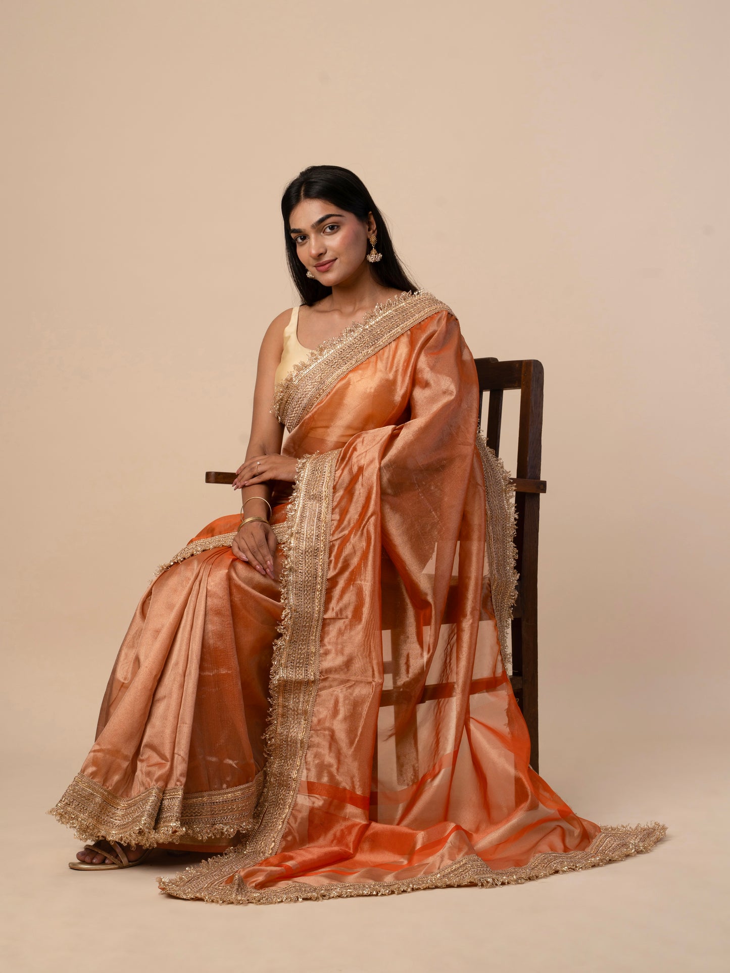 Maharani Tissue Saree with Heavy Gold Embroidered Border