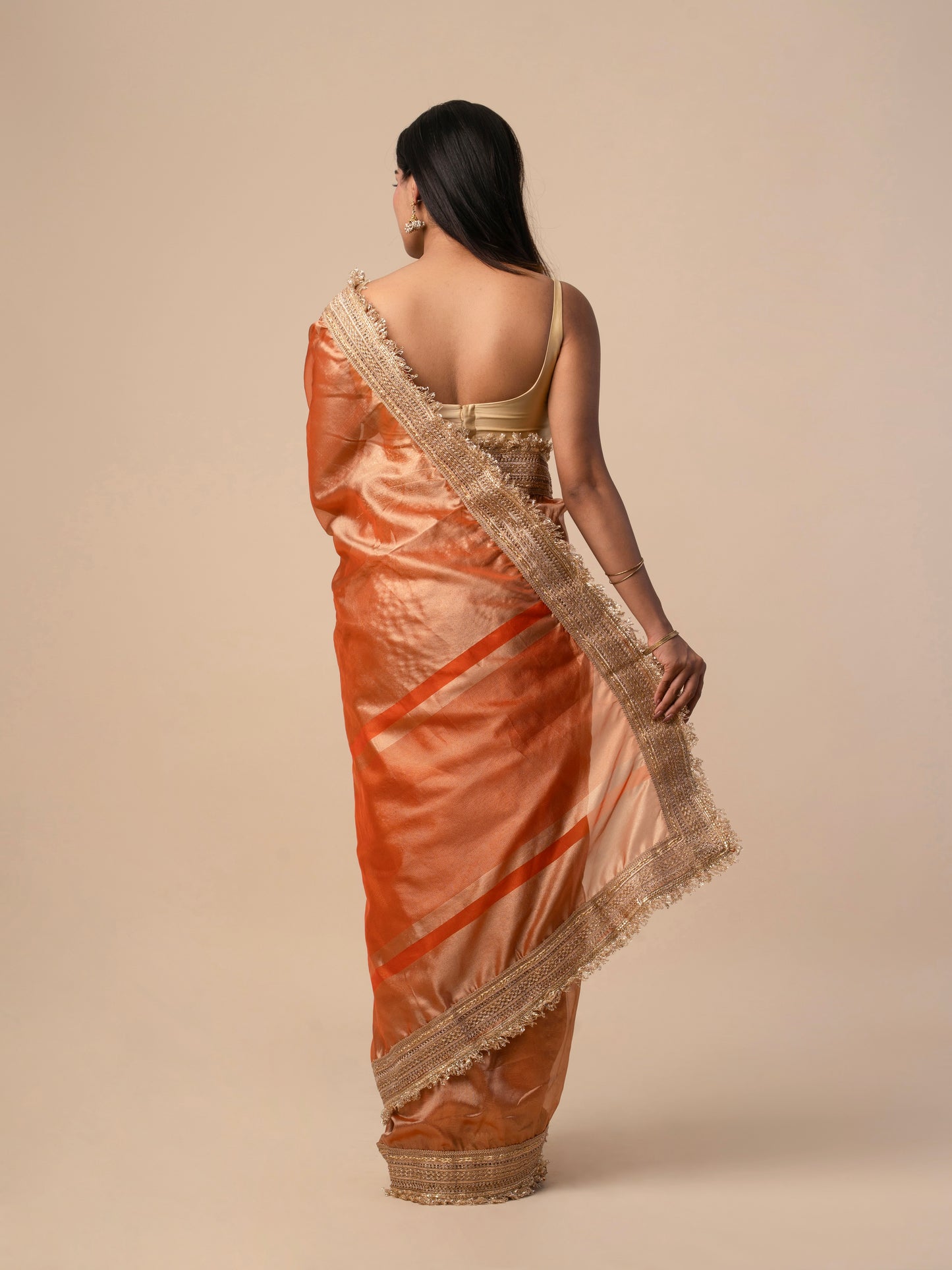 Maharani Tissue Saree with Heavy Gold Embroidered Border