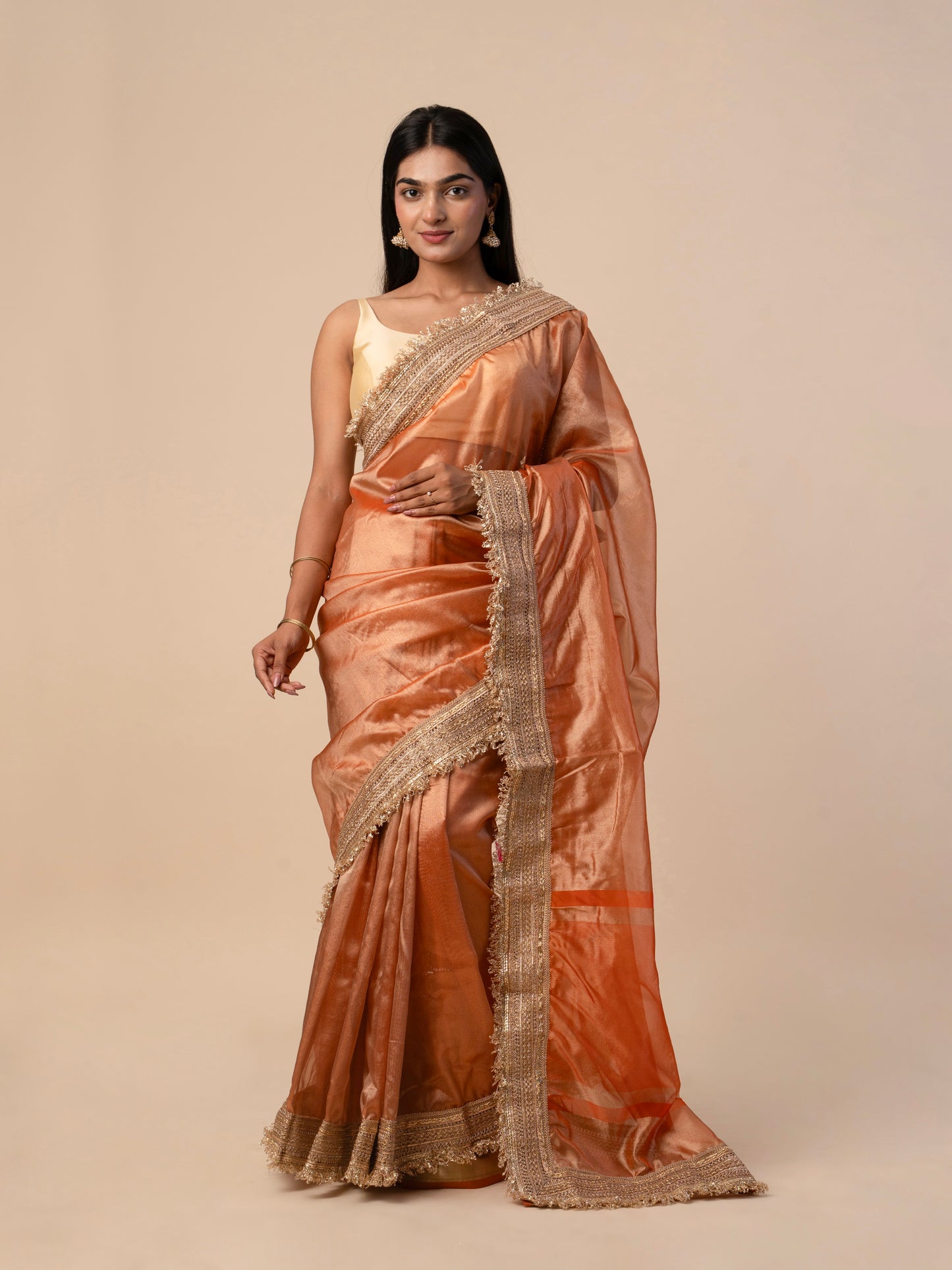 Maharani Tissue Saree with Heavy Gold Embroidered Border