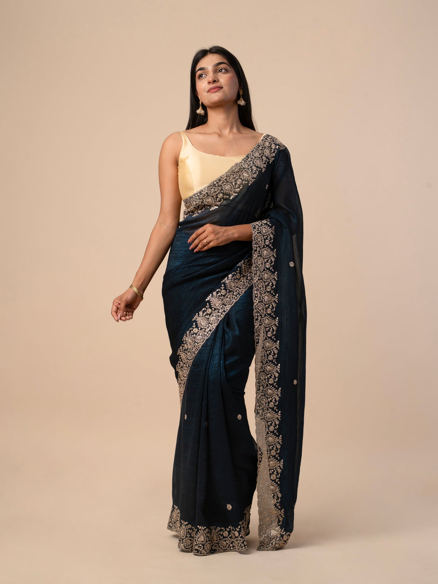 Crushed Zimmy Chuu Saree with Heavy Gold Thread Embroidered Border