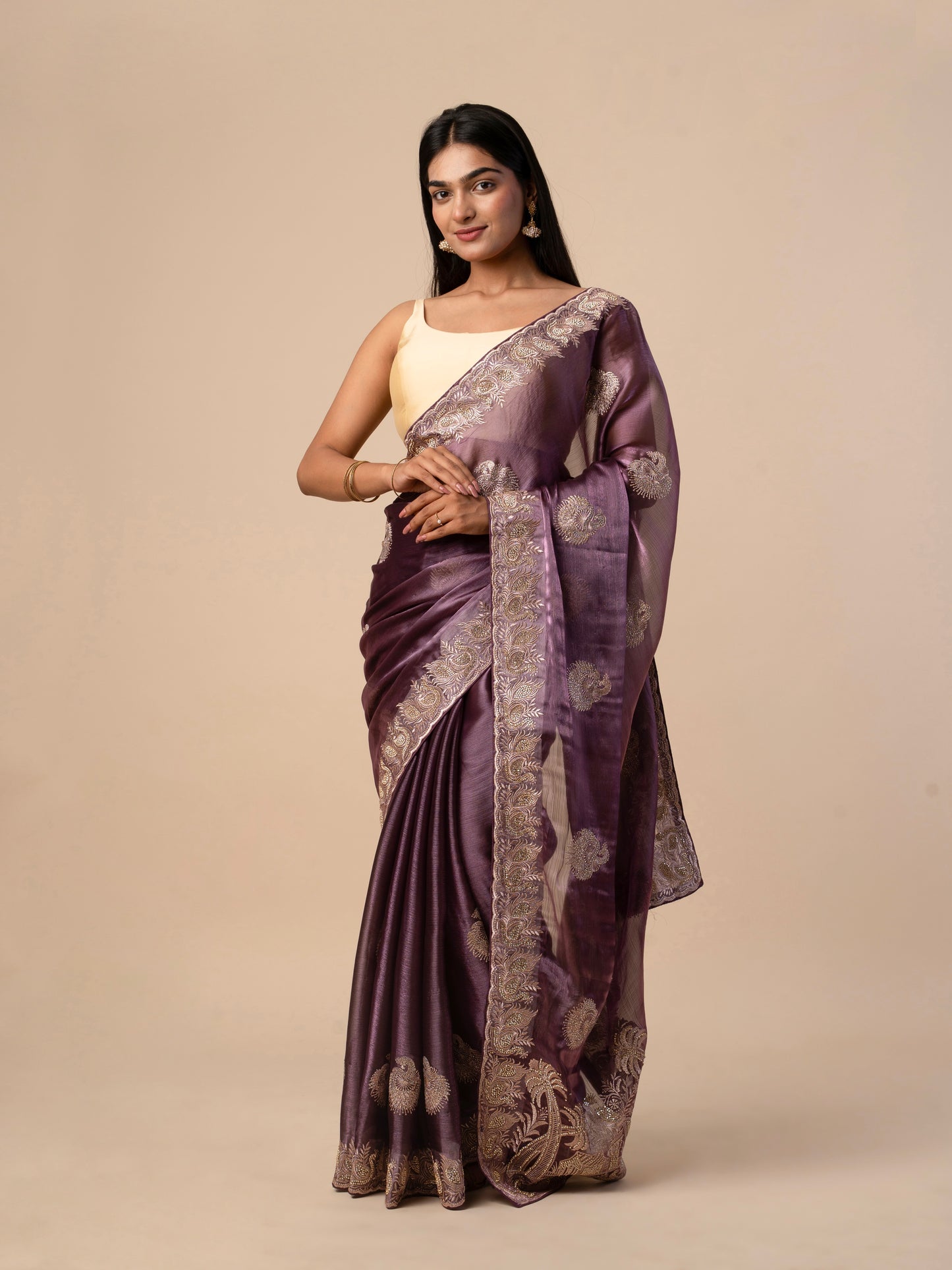 Plum Purple Crushed Zimmy Chuu Saree with Heavy Gold Embroidery and Peacock Motif Border