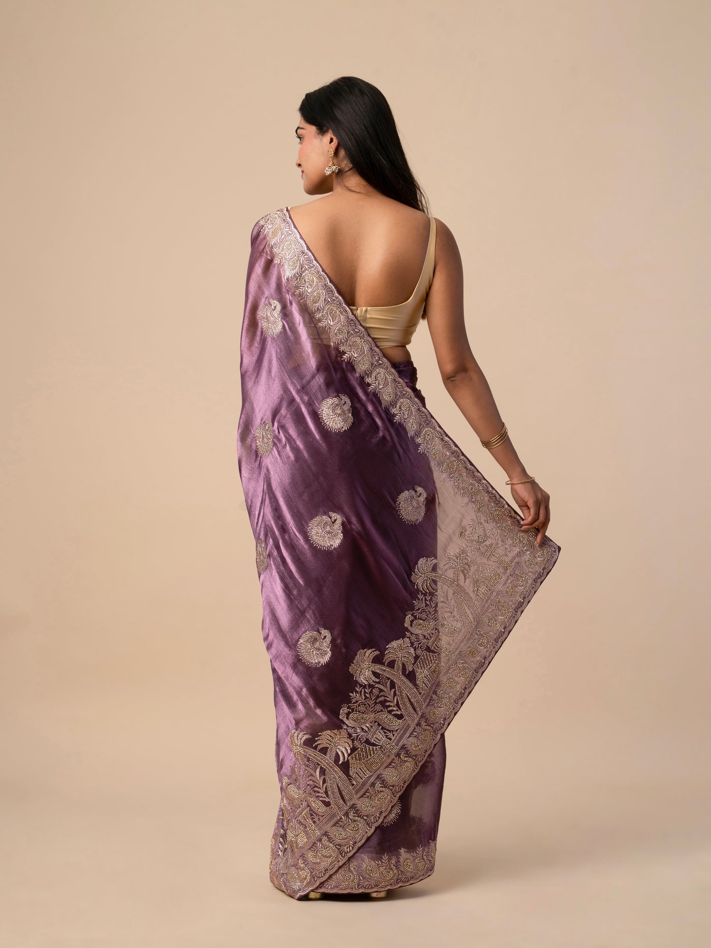 Plum Purple Crushed Zimmy Chuu Saree with Heavy Gold Embroidery and Peacock Motif Border