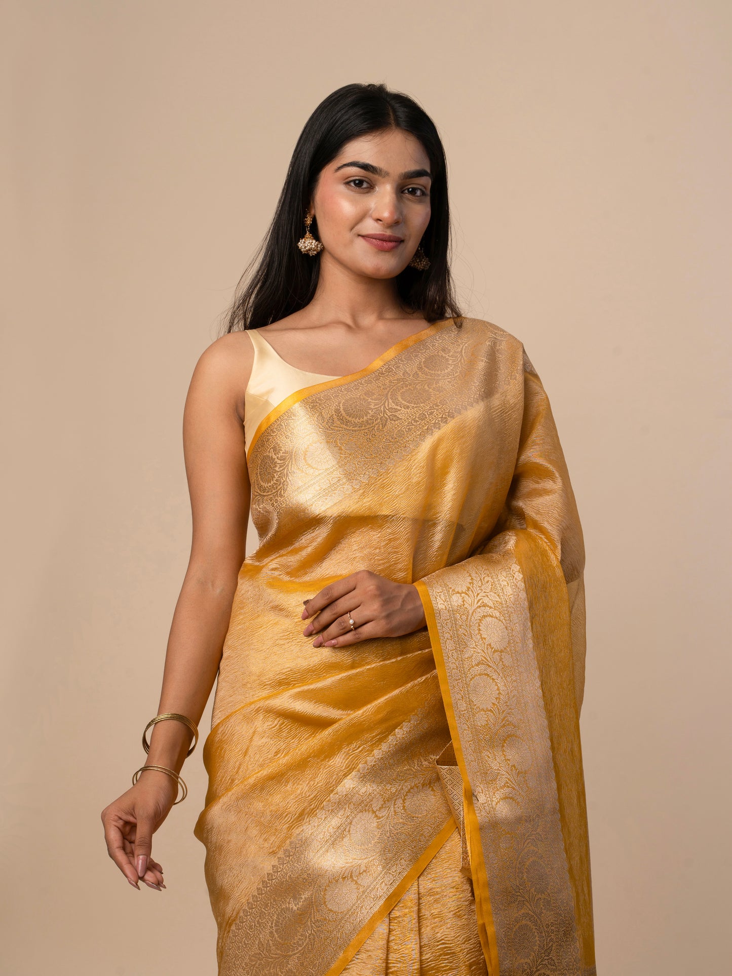 Crushed Tissue Saree with All-Over Zari Floral Weaving and Rich Zari Border