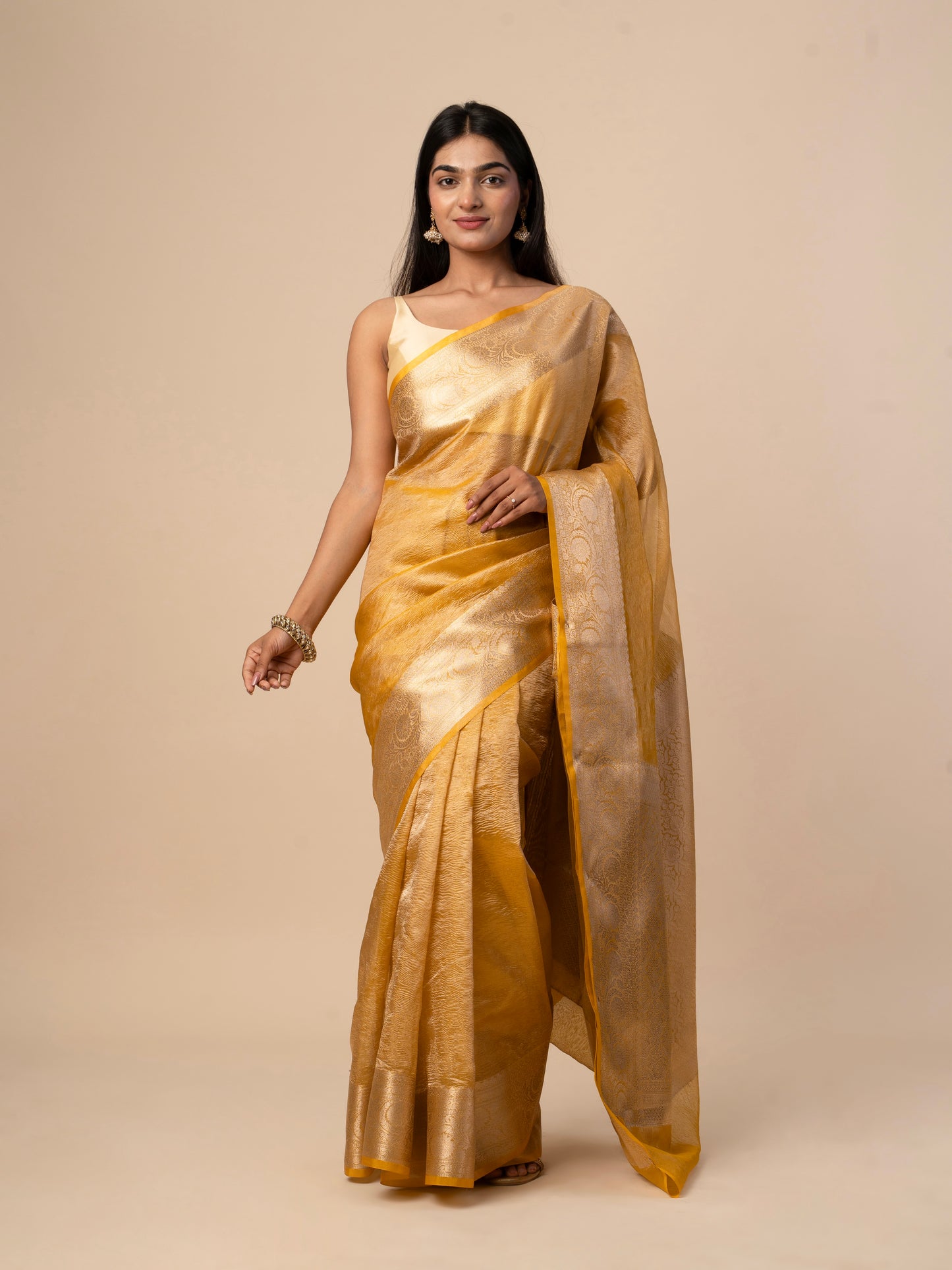 Crushed Tissue Saree with All-Over Zari Floral Weaving and Rich Zari Border